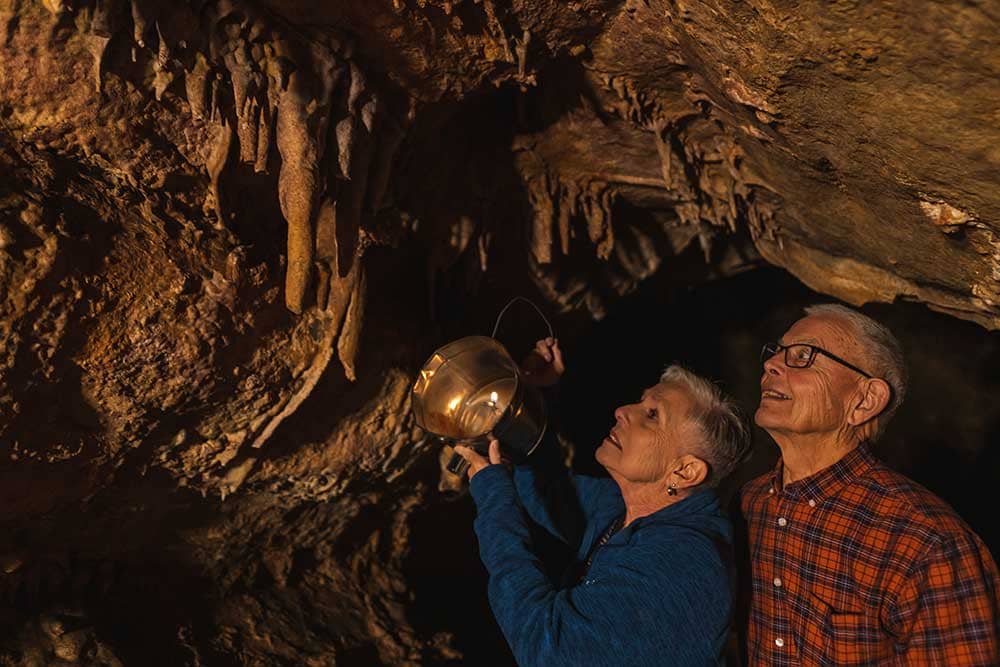 Couple at lantern tour at the Cave of the Winds