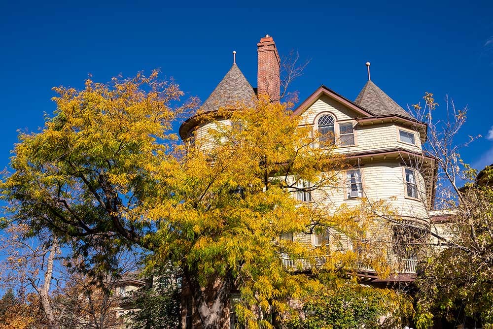 The Cliff House in Manitou Springs with fall trees signaling the Thanksgiving buffet is near.
