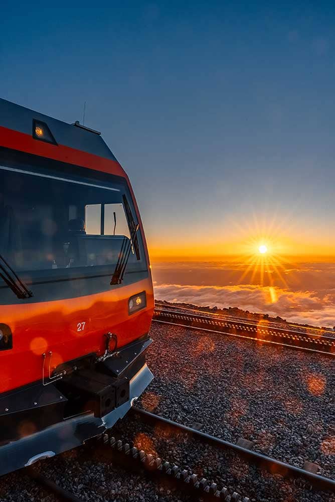 Cog Railway train during sunrise