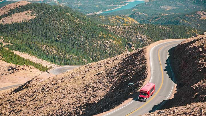 Gray Line bus driving down the Pikes Peak Highway