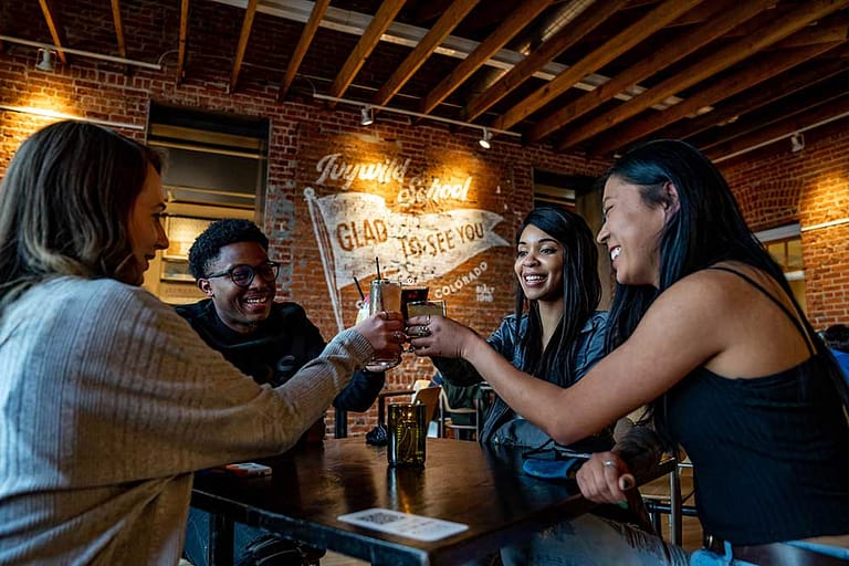 People drinking at Bristol Brewery in Ivywild School