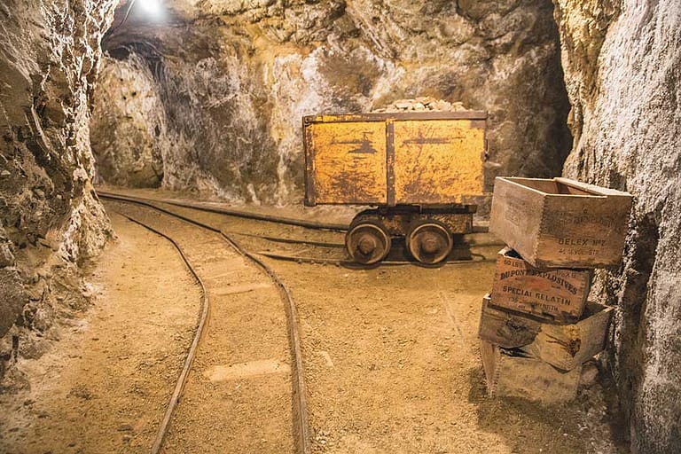 Mollie Kathleen Gold Mine cart in underground tunnel