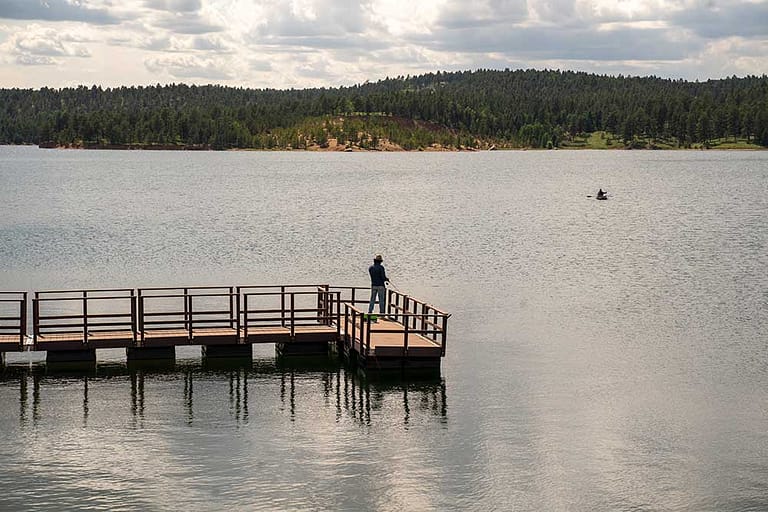Man Fishing on Pikes Peak Reservoir