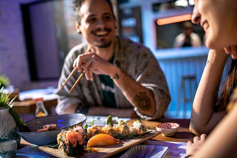 Couple eating sushi