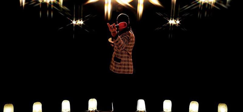 An actor performs on stage at the Iron Springs Melodrama and Dinner Theatre.