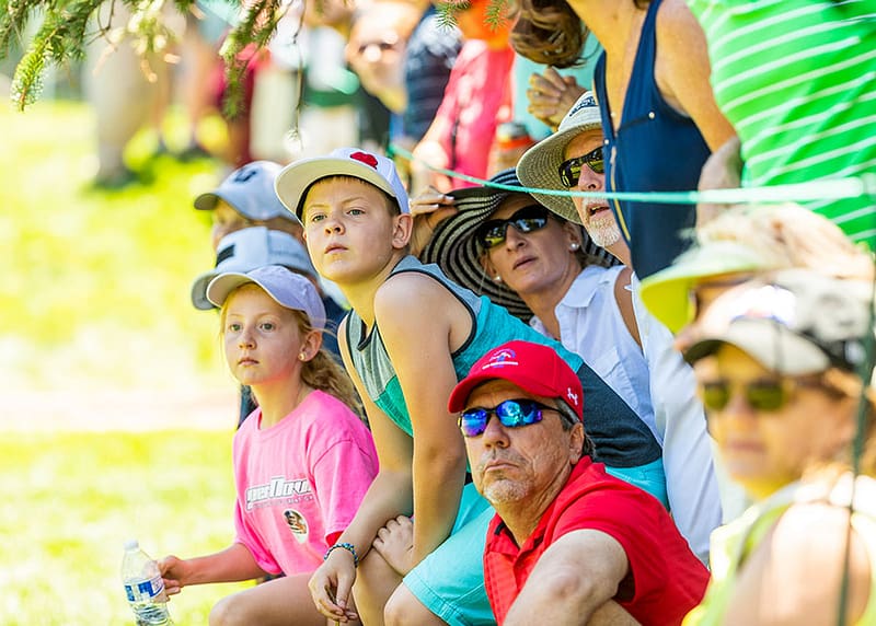 Spectators at a golf tournament