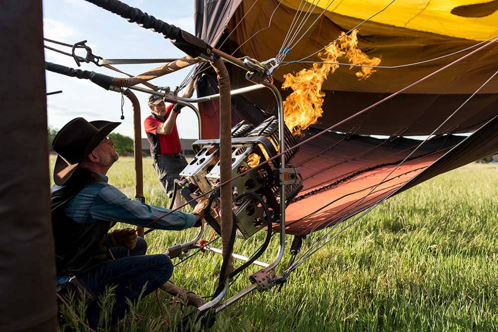 Adventures Out West guide filling hot air balloon