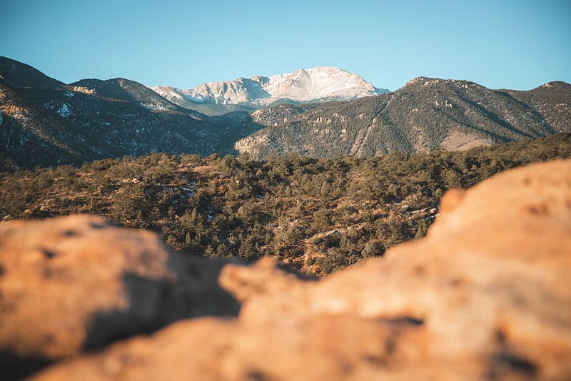 pikes peak with garden of the gods in the foreground