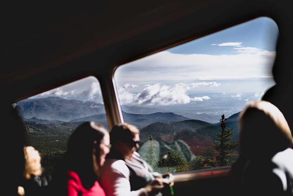 People sitting in Pikes Peak Cog Railway