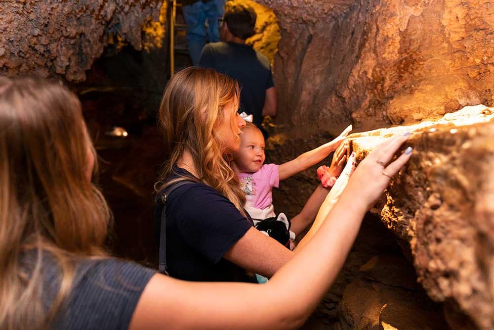 Mother and Daughter in the Cave of the Winds Mountain Park