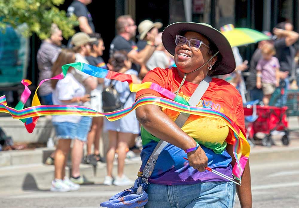 People marching in the Pikes Peak Pride Parade