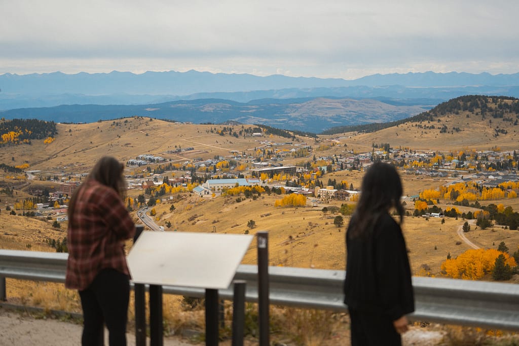 Women looking down at Cripple Creek from overlook
