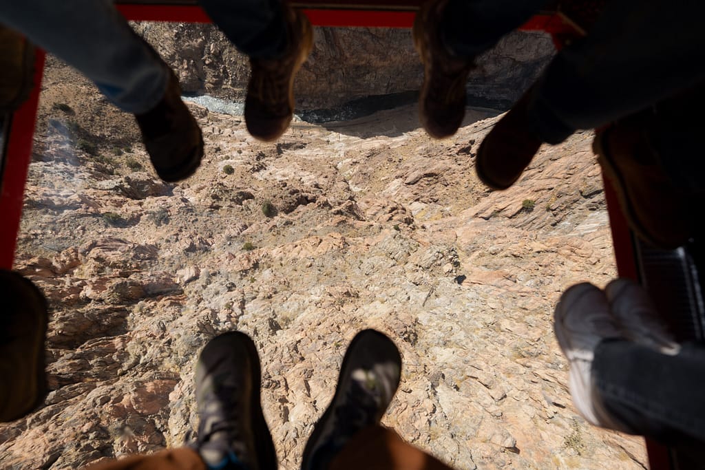 View looking down from the Royal Gorge Bridge glass floor gondola