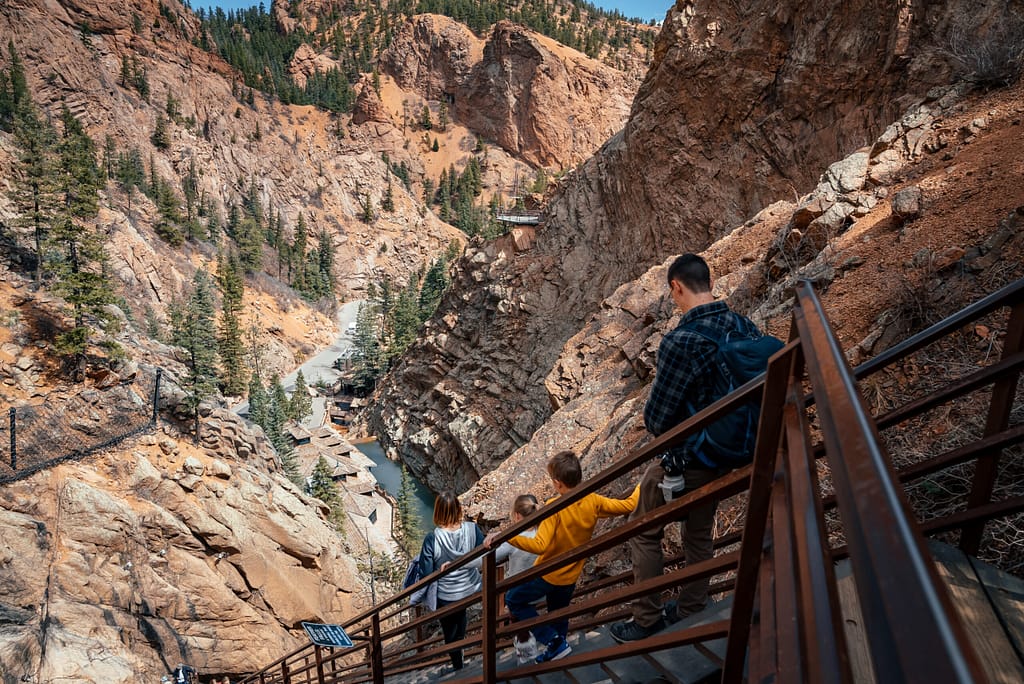 Family walking down stairs at Seven Falls