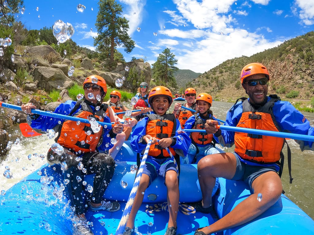 Family rafting Arkansas River with Echo Canyon.