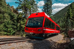 Pikes Peak Cog Railway train in the forest