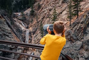 Boy overlooking Seven Falls