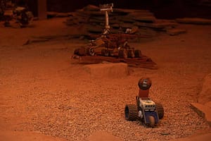 Robots move through the Mars Rover simulation at the Space Foundation Discovery Center.