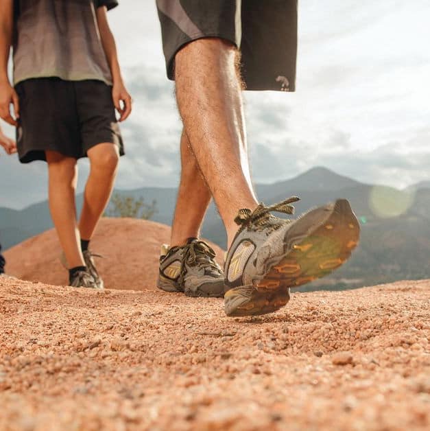 Closeup of family's feet hiking in Garden of the Gods