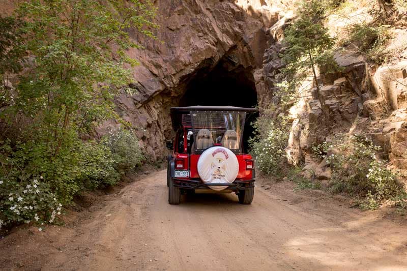 Adventures Out West Jeep going through tunnel